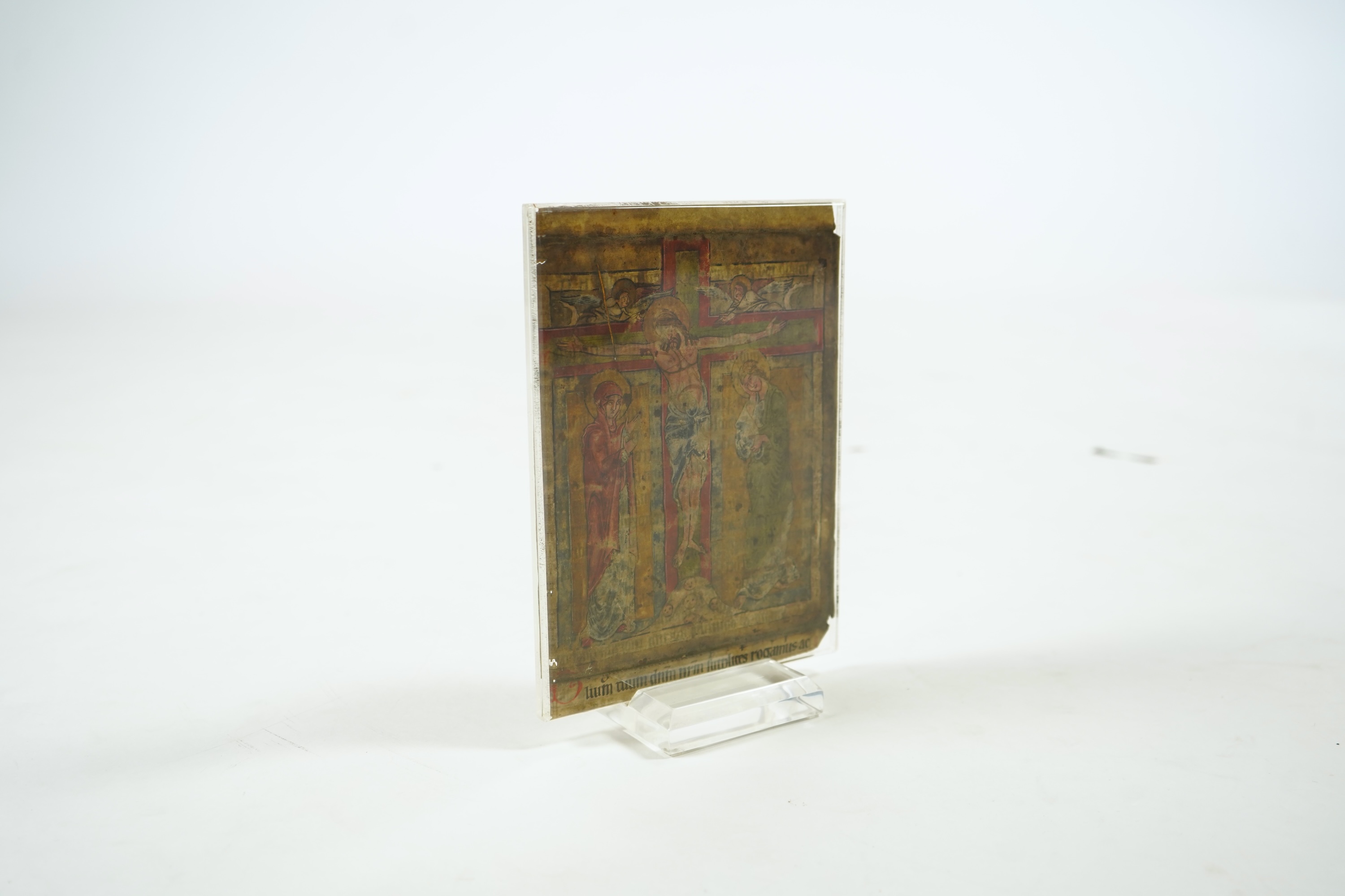 An illuminated leaf from a missal at the Canon, with Crucifixion scene, the reverse inscribed with the Te igitur, probably Austria or South German, second half 12th century